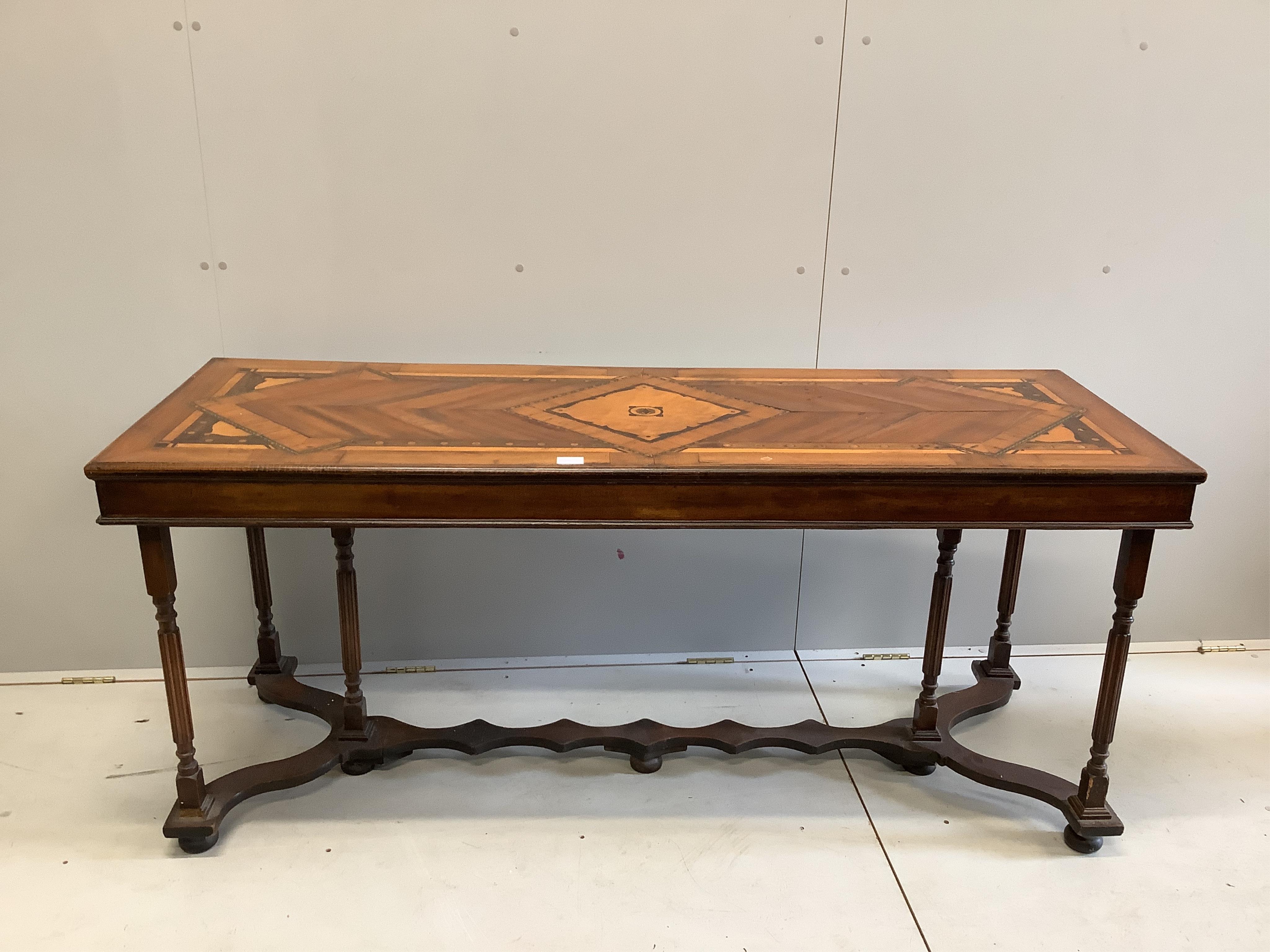 A rectangular parquetry inlaid serving table, width 166cm, depth 60cm, height 73cm. Condition - fair